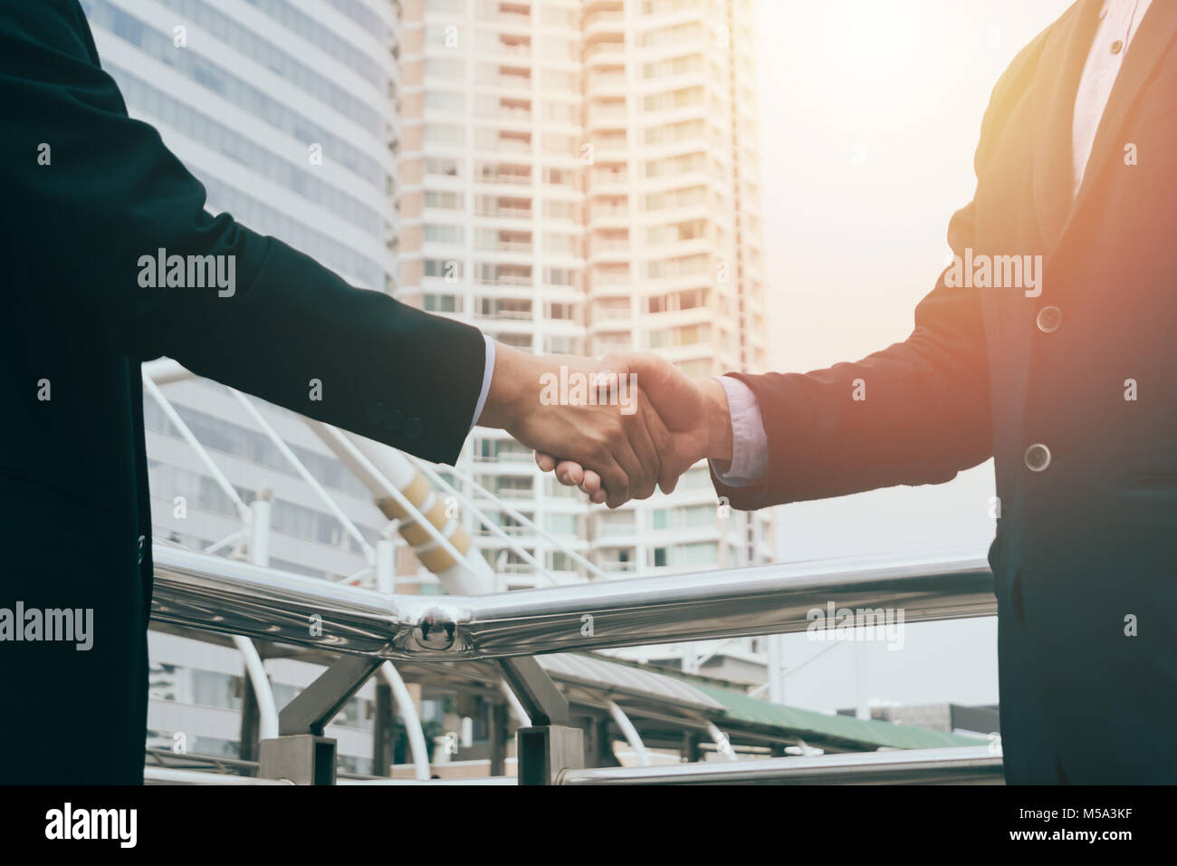 business man hand shaking closing a deal ,business team partnership concept Stock Photo