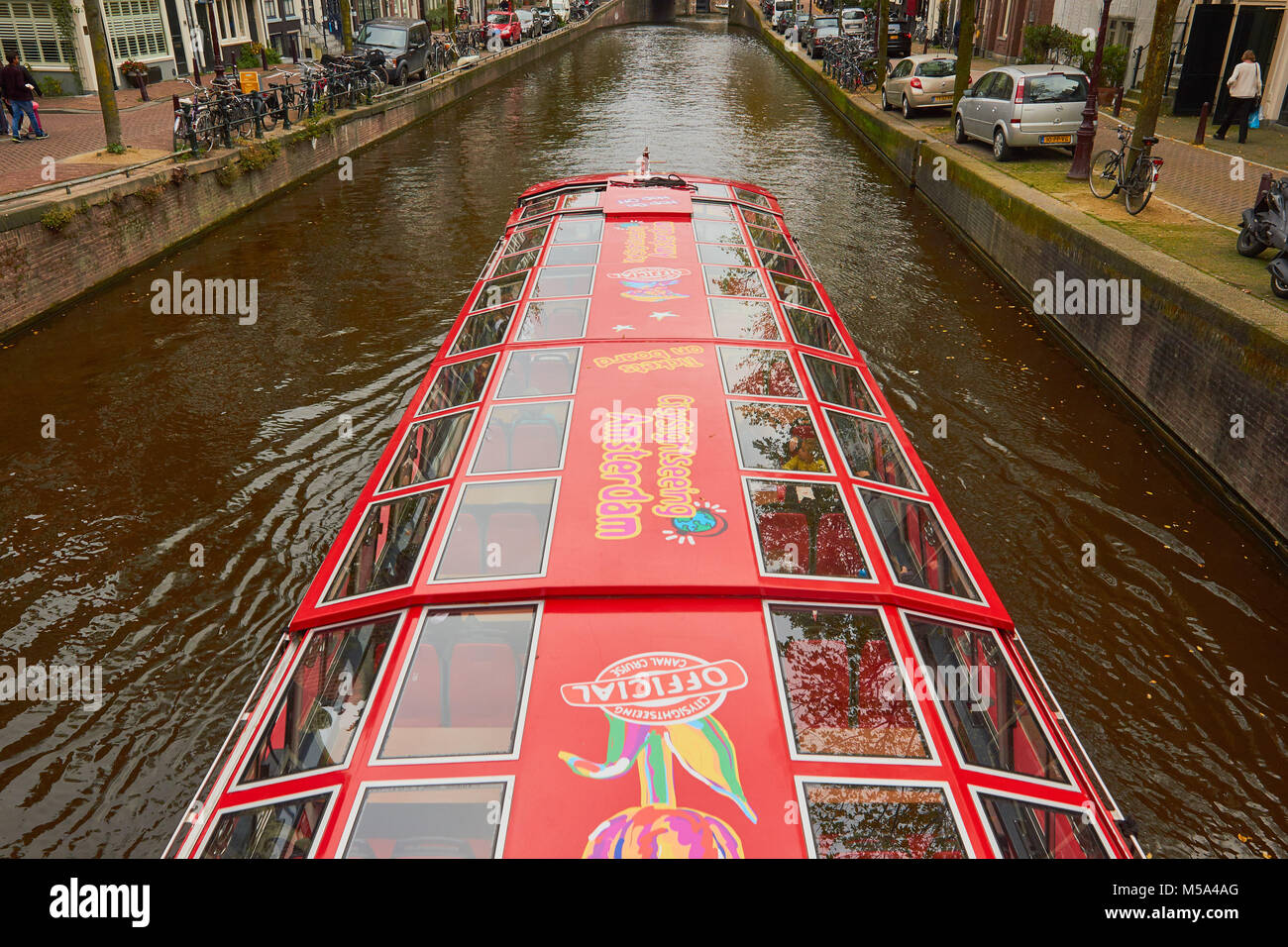 City sightseeing cruise boat from above, Amsterdam, Netherlands Stock Photo