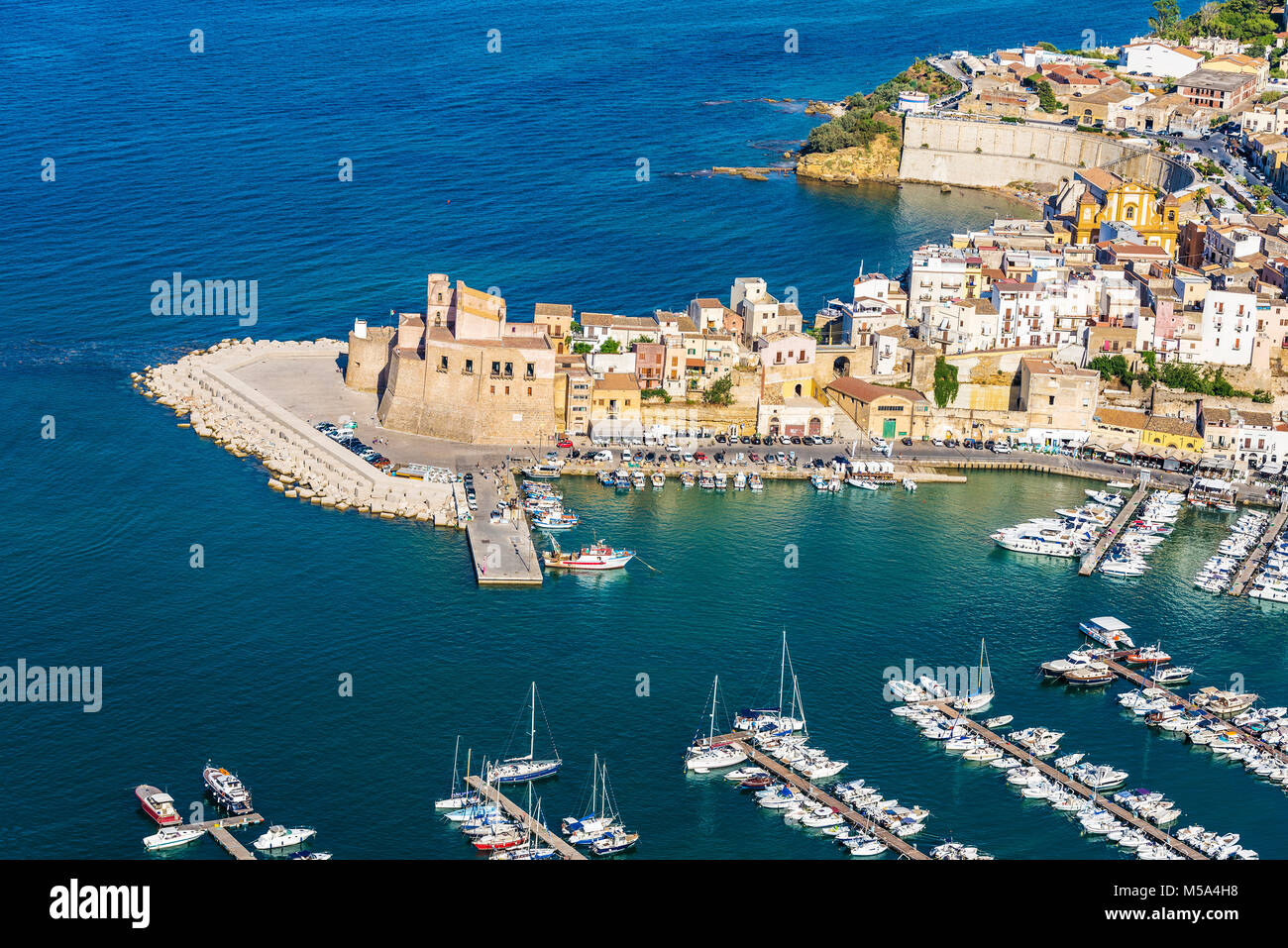 Overview of Castellammare del Golfo with its marina and its medieval ...