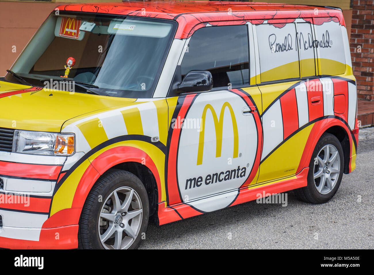 Miami Florida,Hialeah,Ronald McDonald's,McDonalds mascot car  cars,vehicle,Spanish language,bilingual,fast food,restaurant restaurants  dining eating ou Stock Photo - Alamy