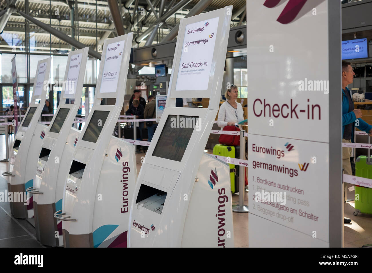 Self-Check-in machines in Linate Airport, Milan, Italy Stock Photo