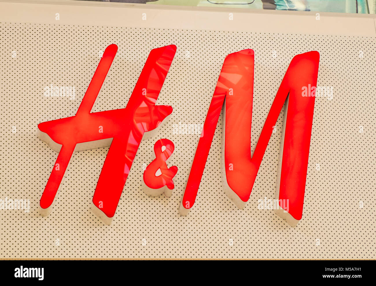 H&M store sign logo, UK Stock Photo