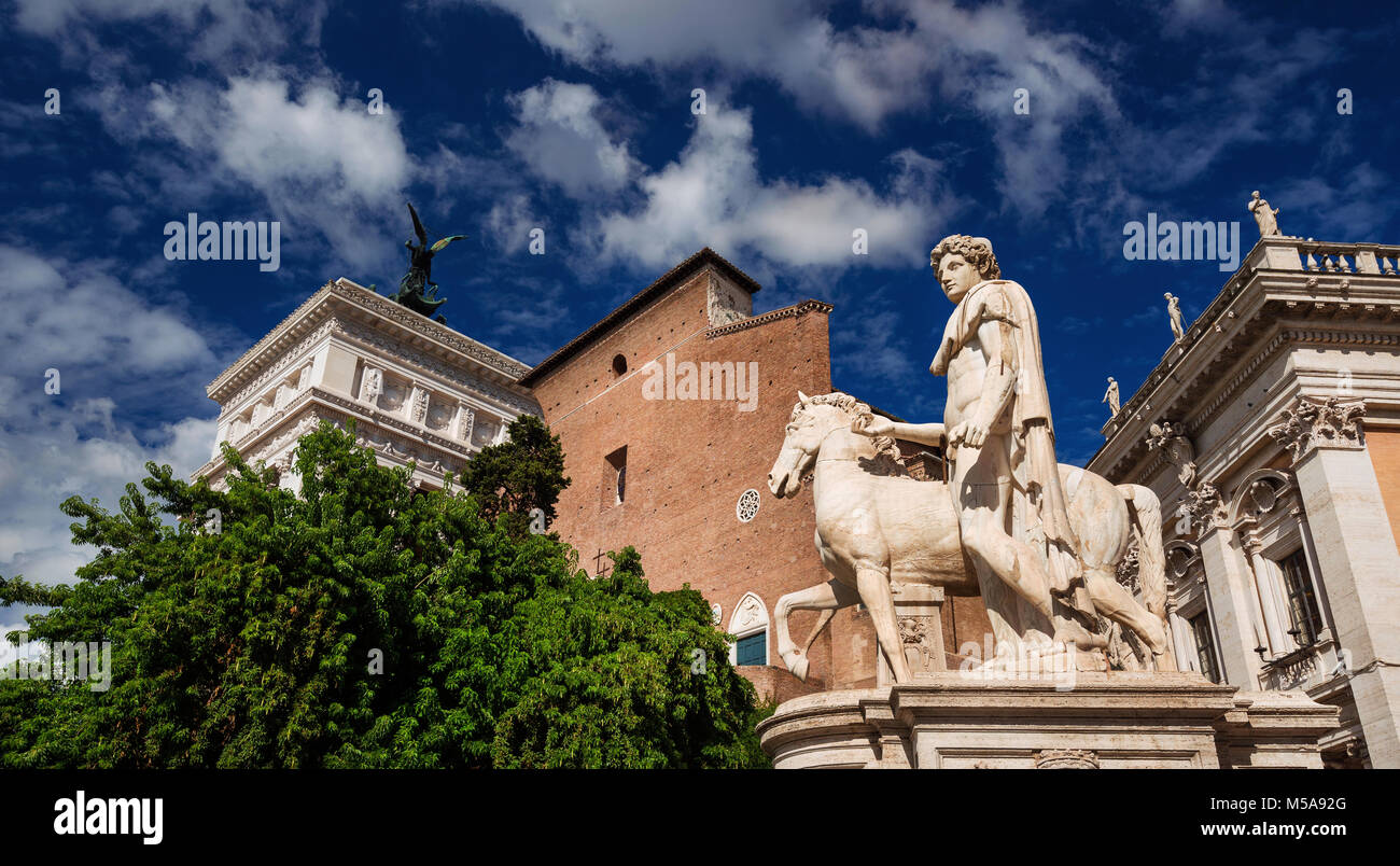 Capitoline Hill monuments with Dioscurus ancient roman statue and clouds, in the historic center of Rome Stock Photo