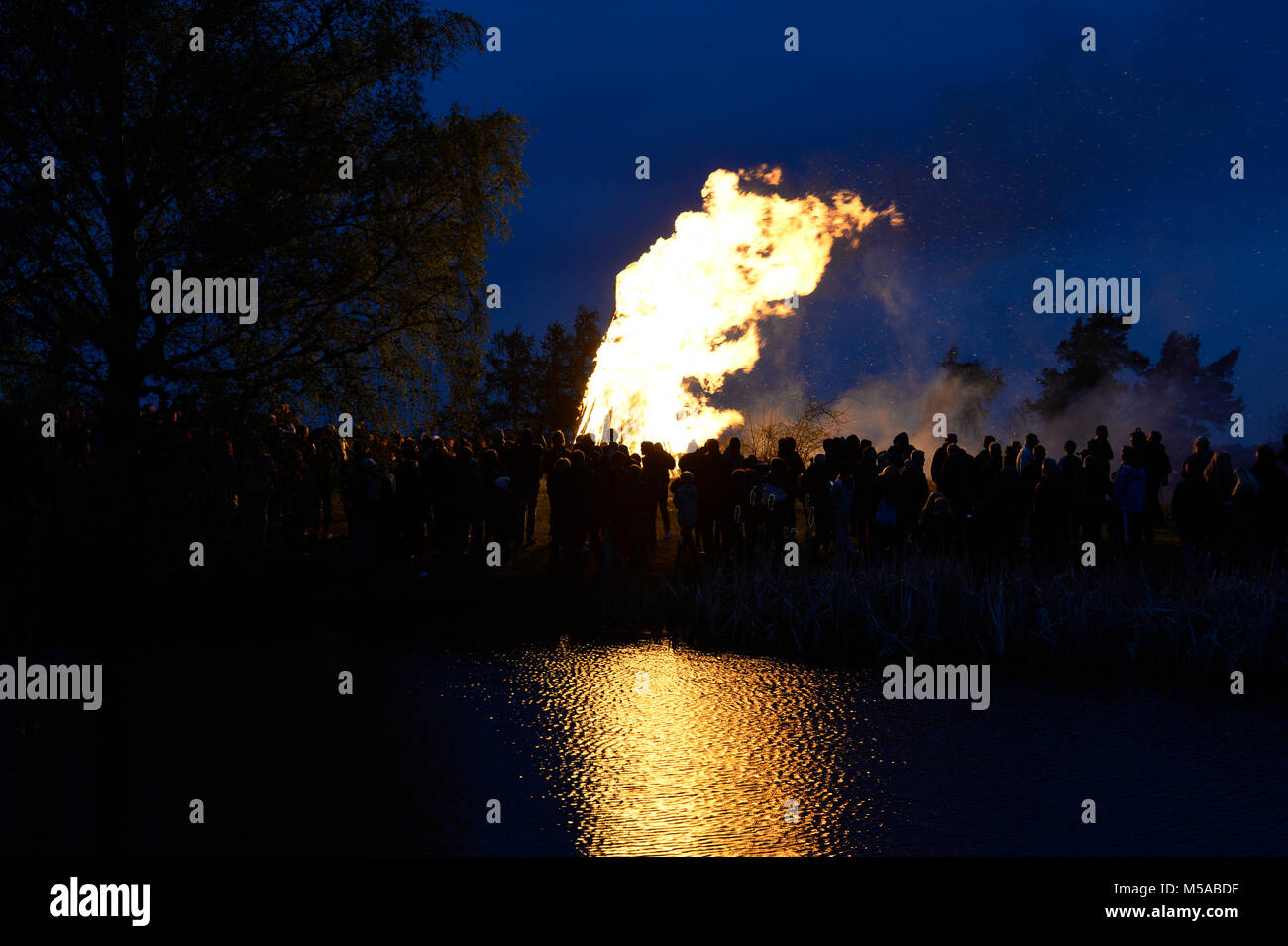 Fireworks in sky, celebration of Valborgsmässoafton in Sweden Stock Photo