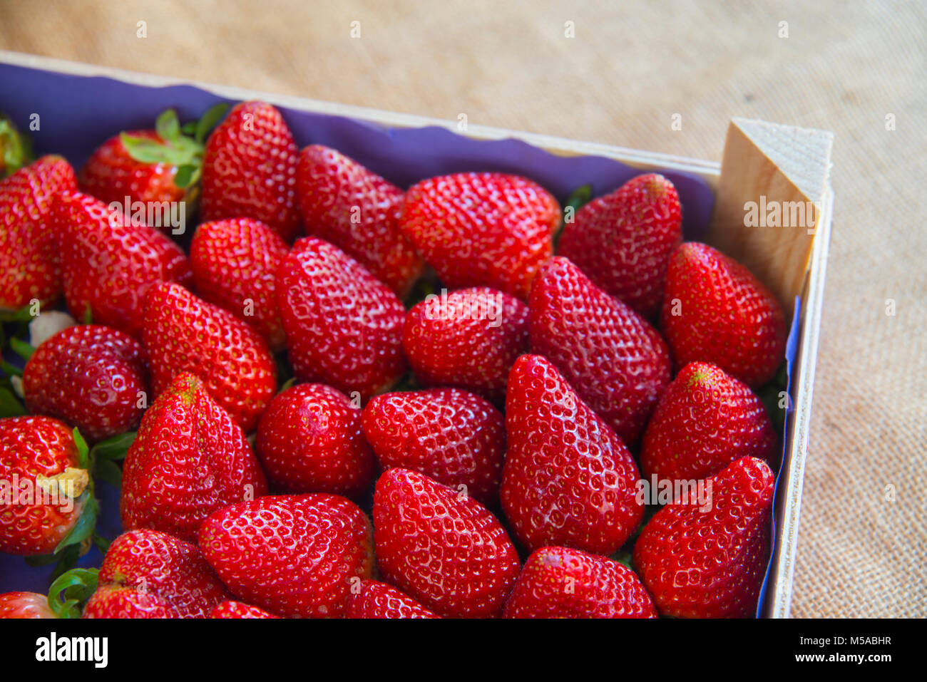 Box full of strawberries. Stock Photo