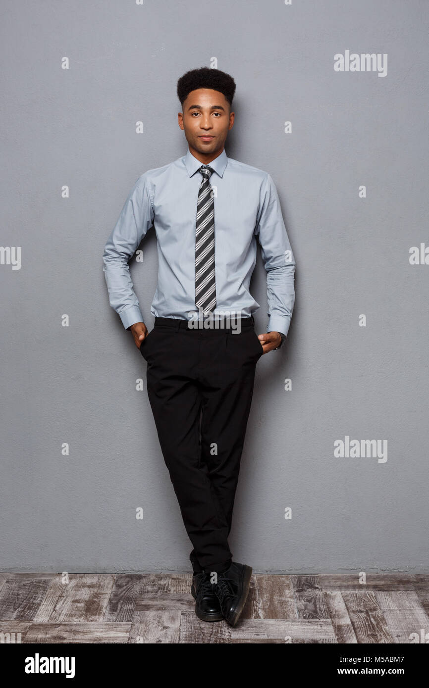 Business Concept - Full length portrait of confident african american ...