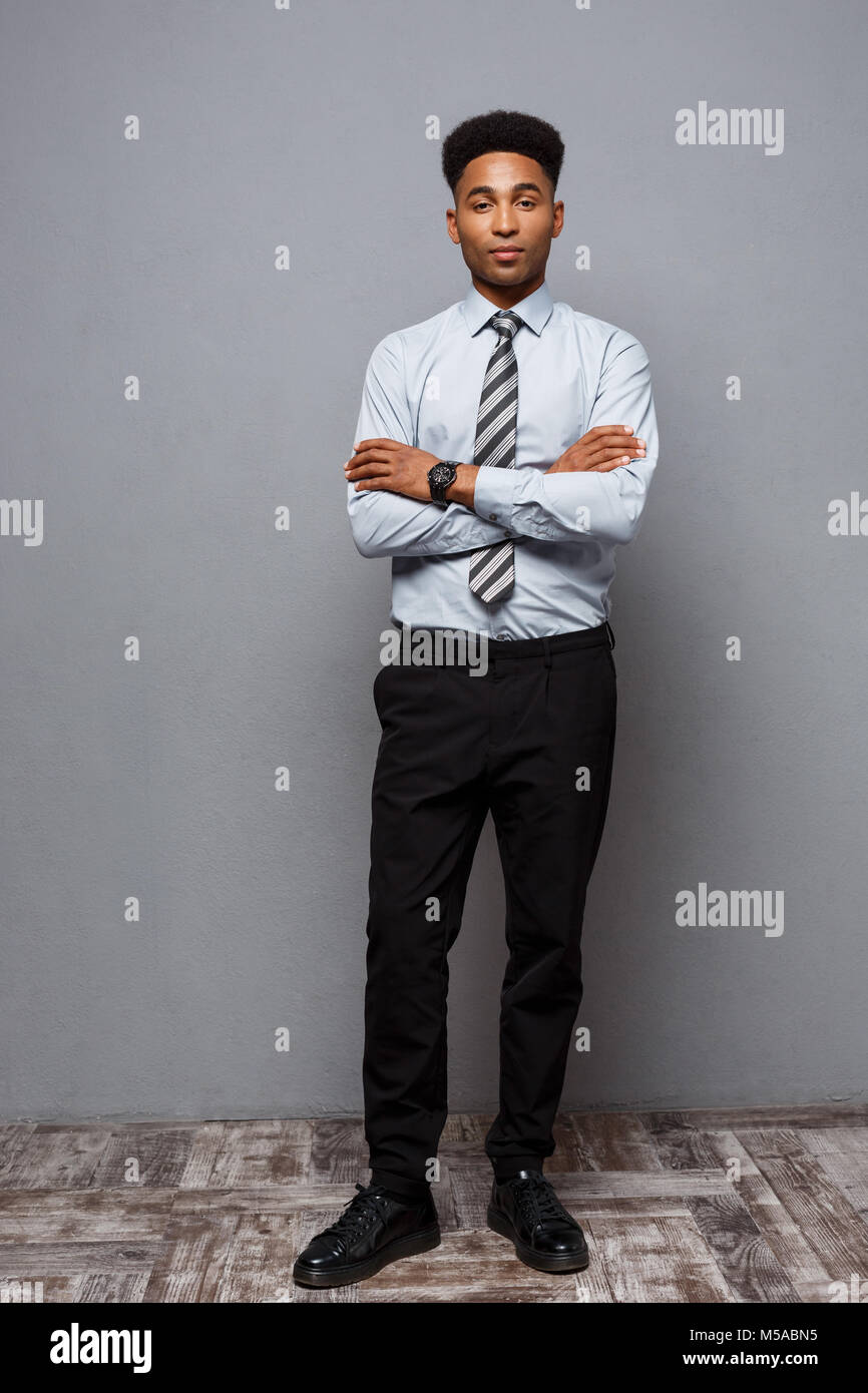 Business Concept - Full length portrait of confident african american ...