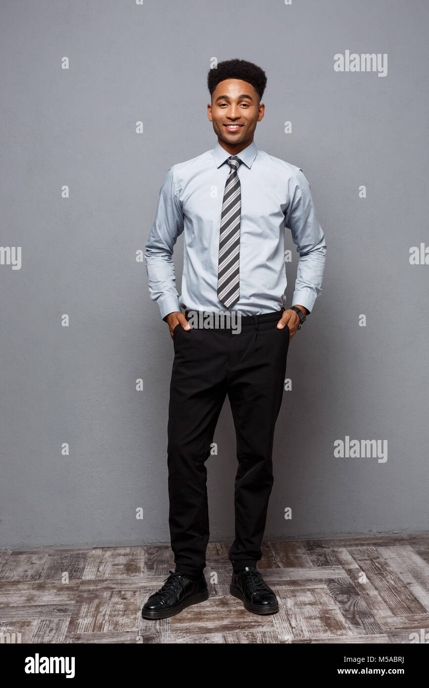Business Concept - Full length portrait of confident african american ...