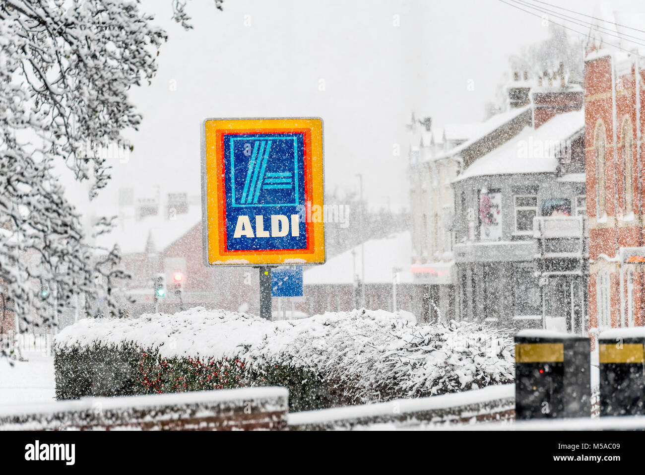 Northampton UK December 10, 2017: Aldi logo sign under heavy winter