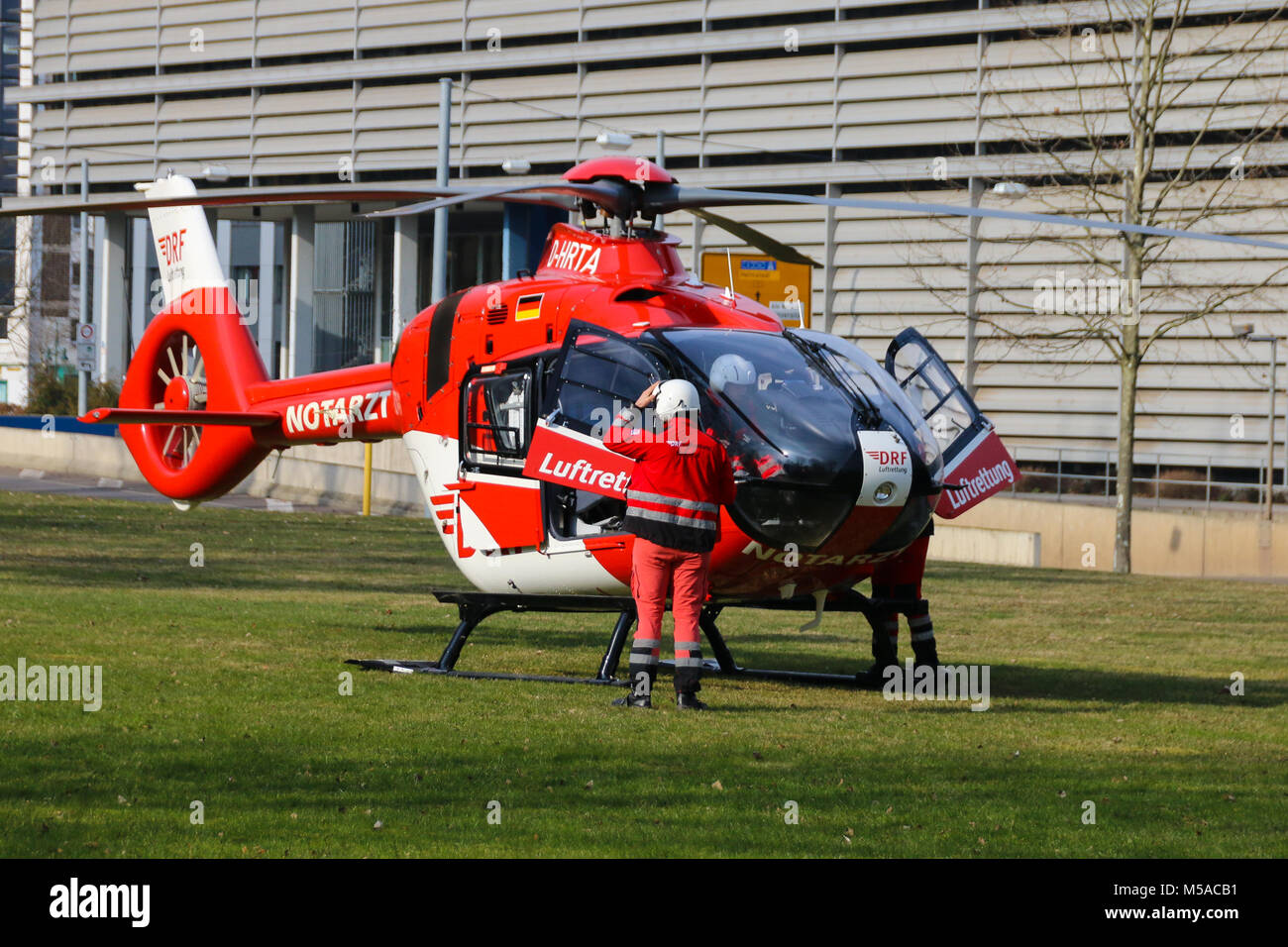 Magdeburg, Germany - 21 February 2018: The medical team and the pilot of the rescue helicopter Christoph 36 of the Magdeburg University Hospital are p Stock Photo