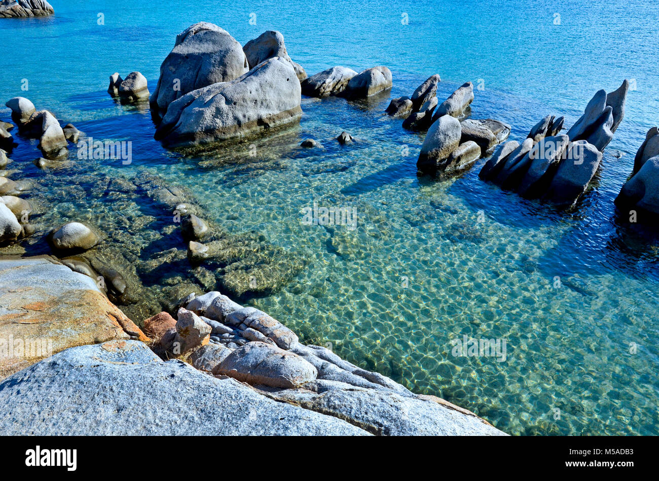 Italian Beaches Rocks Sardinia, Italy: rocks and sea at Beach Stock Photo - Alamy