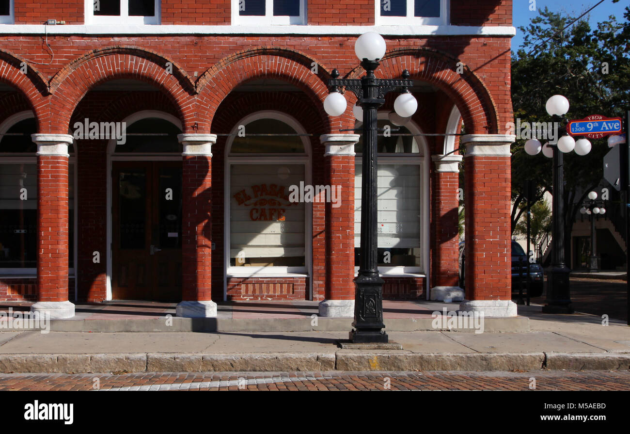 TAMPA, FLORIDA: View of the historic brick archways of the El Pasaje building on 9th Avenue in Tampa's Ybor City Historic Landmark District. Stock Photo