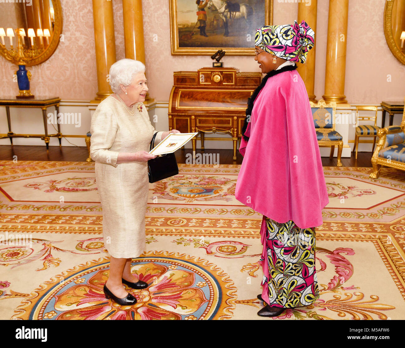 Queen Elizabeth II talks with Mrs Ammo Aziza Baroud, the Ambassador of the Republic of Chad, after she presented her Letters of Credence during a private audience at Buckingham Palace in London. Stock Photo