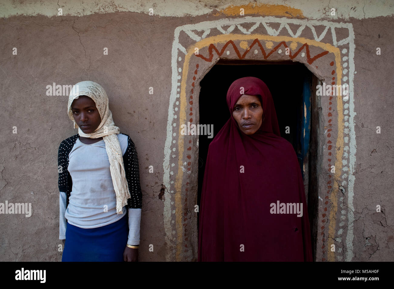 Portrait of Munira Hussein and her daughter. Munira's husband died in the Mediterranean sea while trying to reach Europe ( Ethiopia) Stock Photo