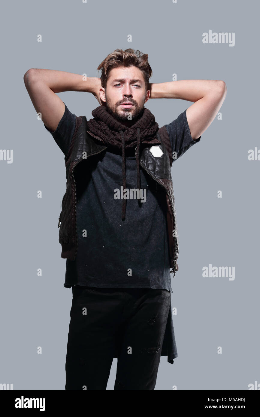 bearded man in casual clothes on a gray background Stock Photo - Alamy