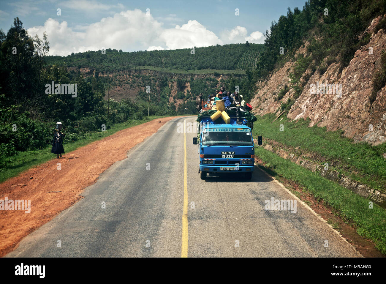 Uganda - September 19, 2011: A truck full of poeple on the highway between Kampala and Kabale. Stock Photo