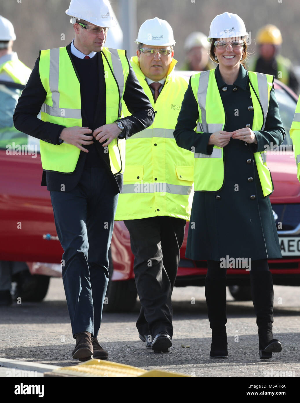 The Duke and Duchess of Cambridge wear safety helmets and high visibility vests during a visit to the Northern Spire bridge across the River Wear in Sunderland. Stock Photo
