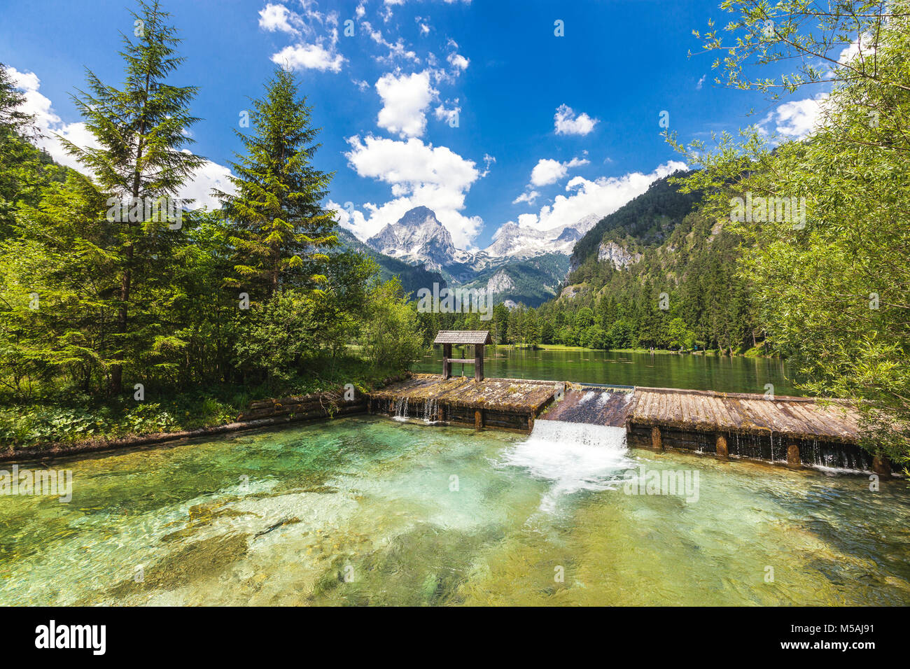 At the Schiederweiher in Hinterstoder with a view at the mountain peaks Spitzmauer and Grosser Priel. Stock Photo