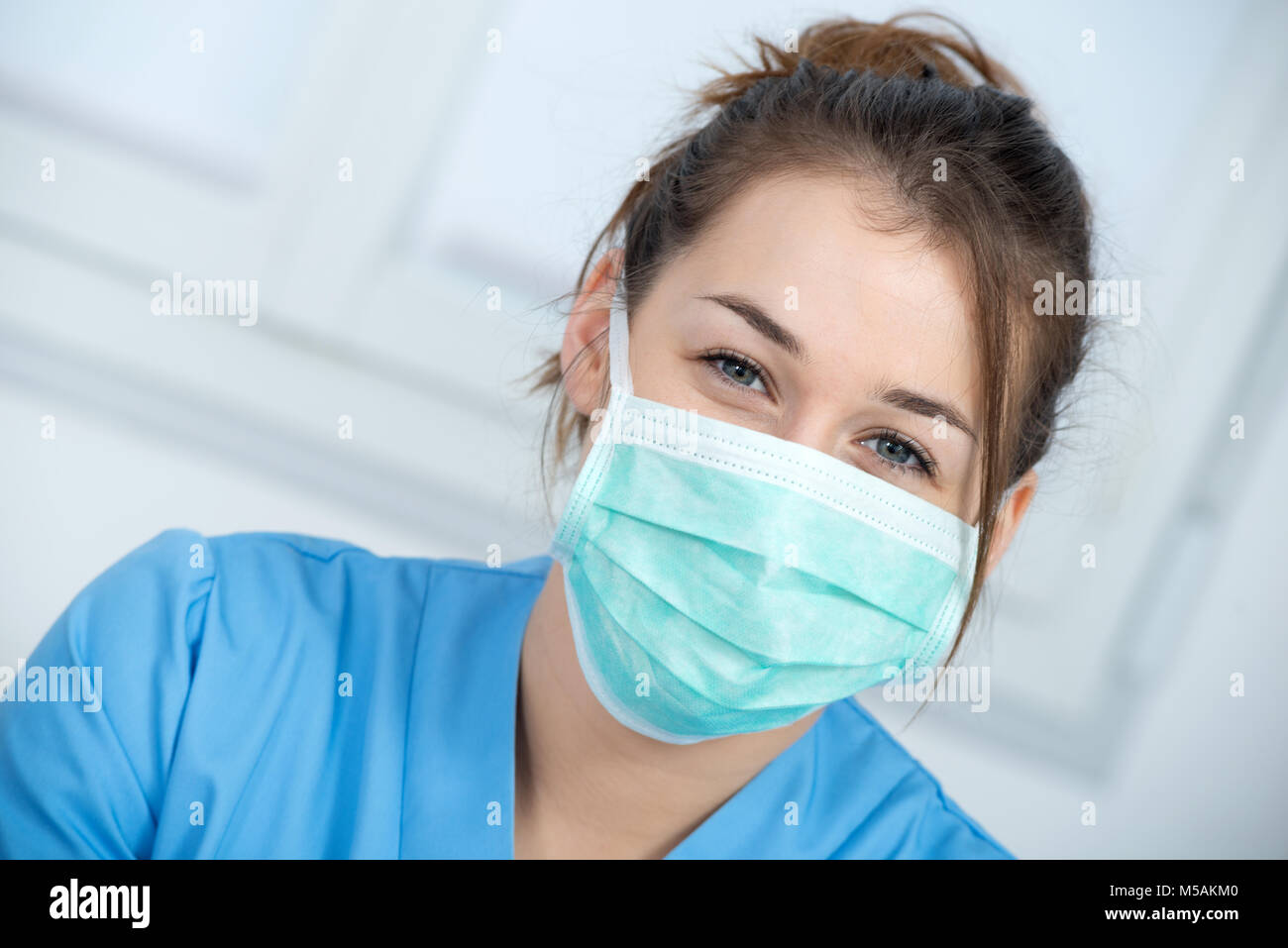 portrait of a young nurse with a mask Stock Photo - Alamy