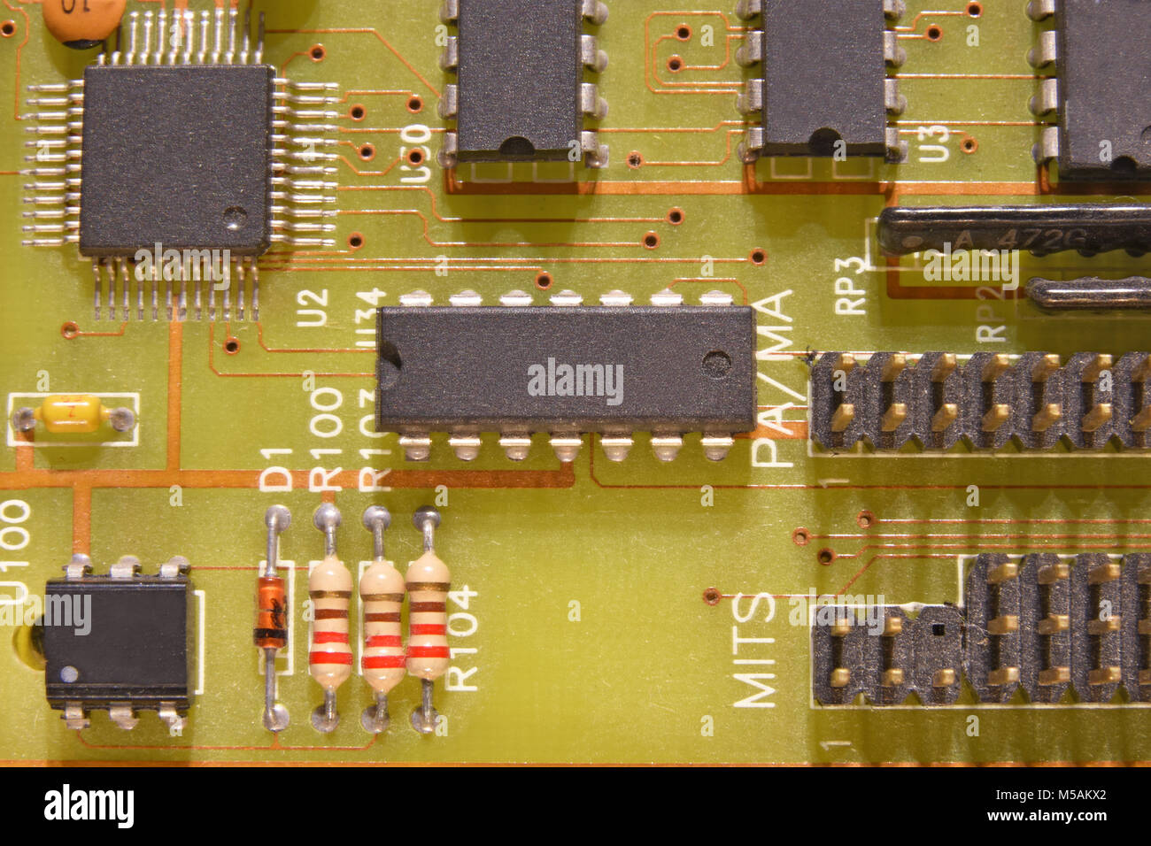 Close up of an electronical circuit board with microchips Stock Photo