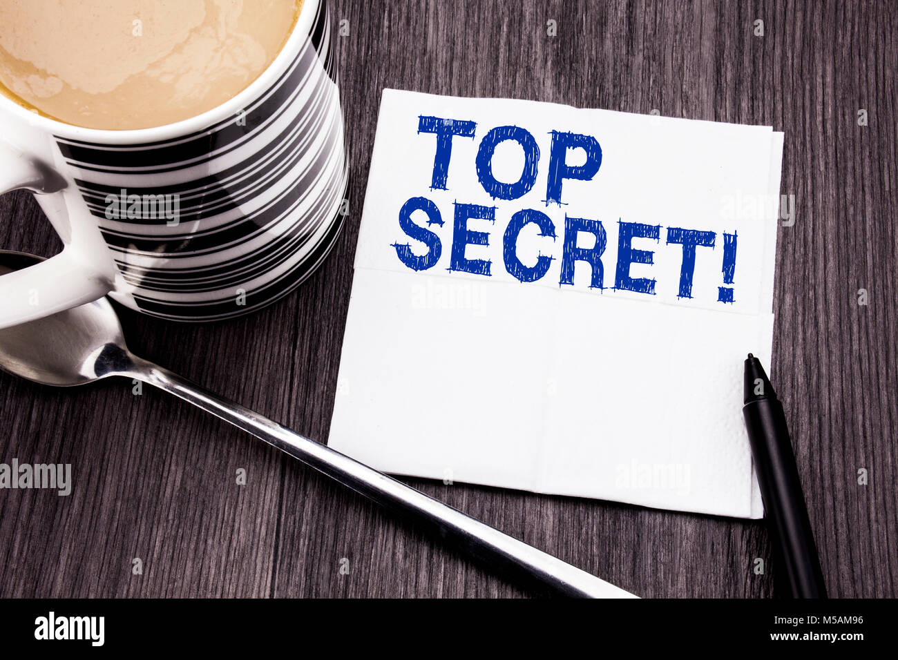 Handwritten text showing Top Secret. Business concept for Military Top