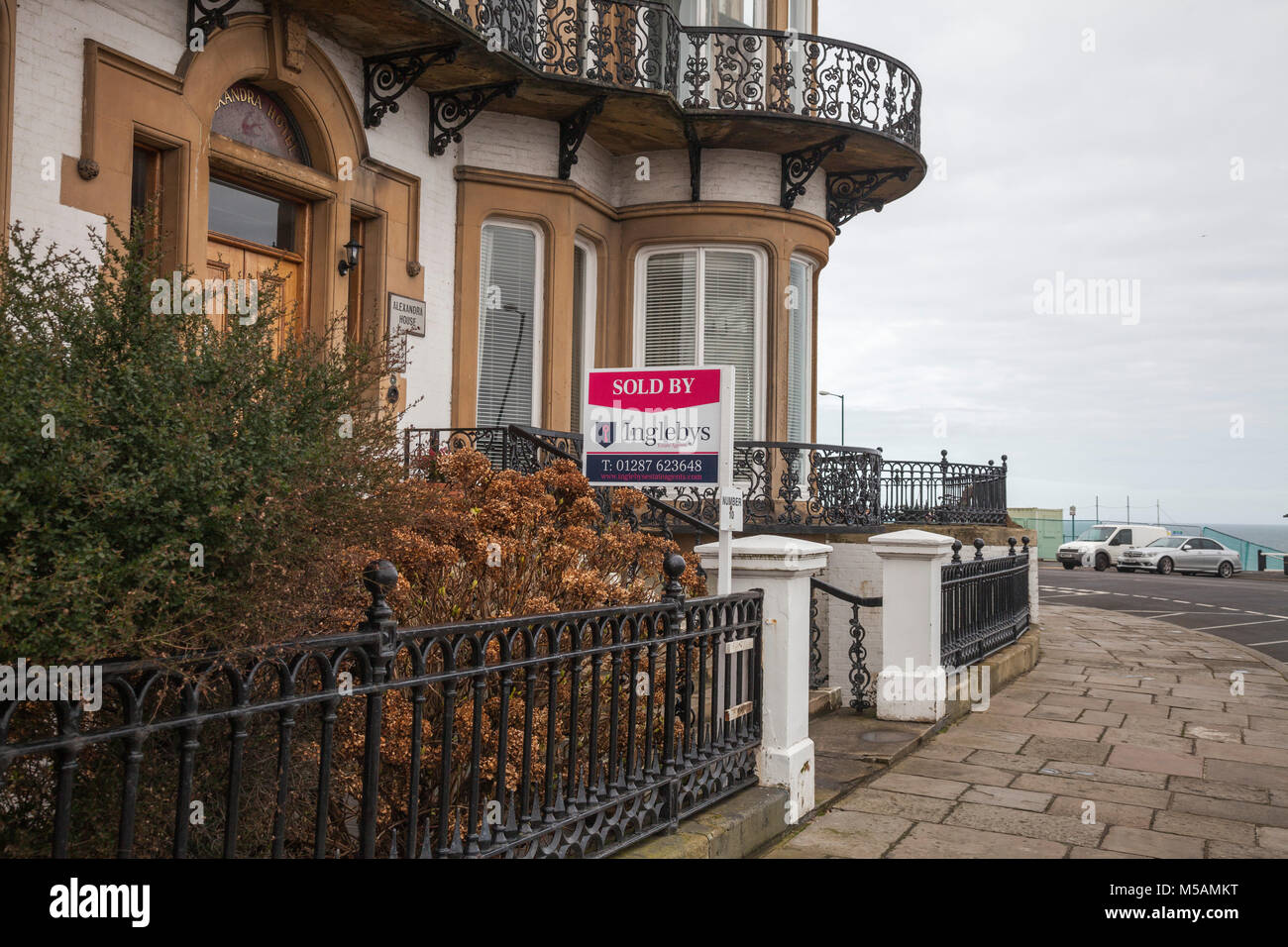 Sold sign outside a Victorian terraced house in Saltburn by the Sea,England,UK Stock Photo