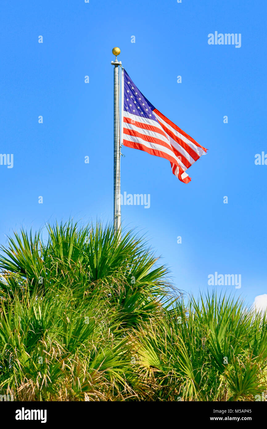American flag wafts gently in the sea breeze at Boca Grande on Gasparilla Island FL, USA Stock Photo