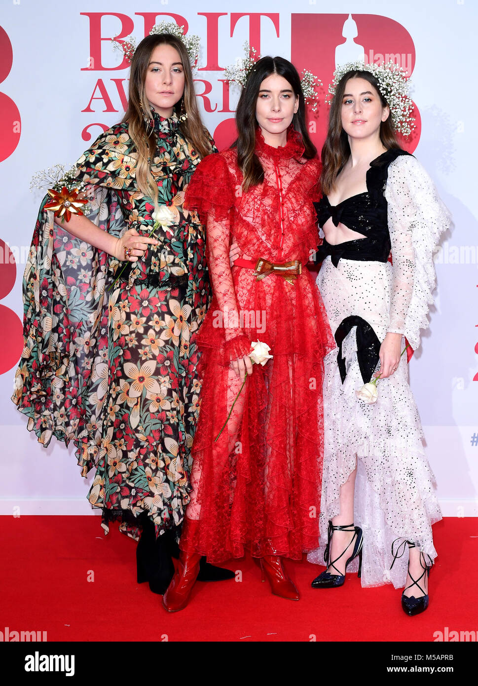 HAIM's Este Haim, Danielle Haim and Alana Haim attending the Brit