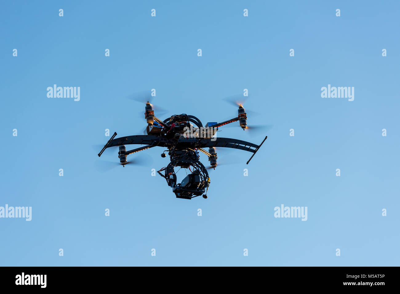 Professional drone flying with 4K camera Stock Photo