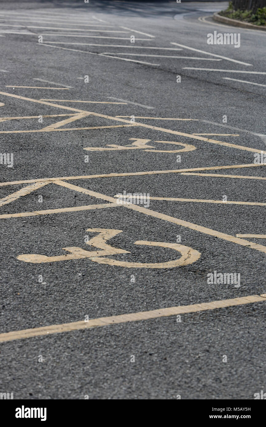 Close-up of disabled car parking spaces in Bosham, West Sussex, UK. Stock Photo