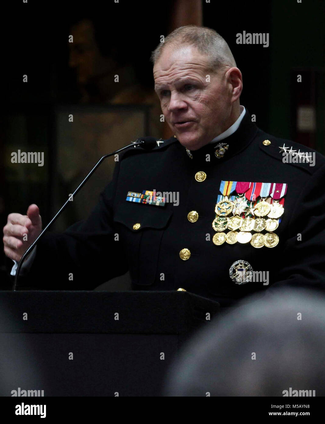 Commandant of the Marine Corps Gen. Robert B. Neller speaks to military service members and attendees during Prairie View A&M University Naval Reserve Officers Training Corps (NROTC) 50th Anniversary, Washington Navy Yard, Washington, D.C., February 14, 2018. The event was to honor the 50th anniversary of the first NROTC at a historically black college, which was established at Prairie View in 1968. (U.S. Marine Corps Stock Photo