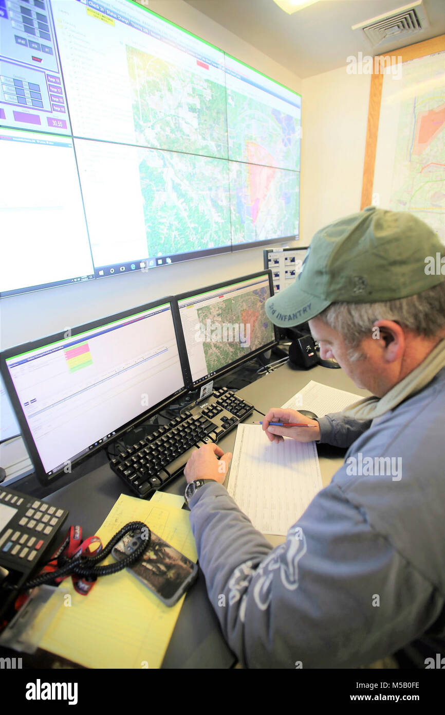 Range Control Technician Mark Confer with the Directorate of Plans, Training, Mobilization and Security works at the Fire Desk on Jan. 16, 2018, at Fort McCoy, Wis. The desk operates communications with units using the range complex as well as Range Maintenance and other personnel throughout 46,000 acres of training areas on Fort McCoy. (U.S. Army Stock Photo