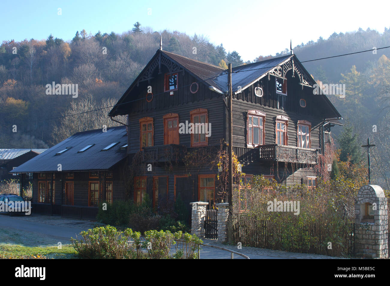 House In The Forest with Trees with Golden Dry Leaves Stock Photo - Alamy