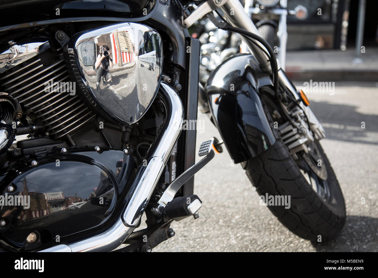A motorcycle is a prop in the F/W 18 Fashion show by Ashton Michael in Hollywood, CA Stock Photo