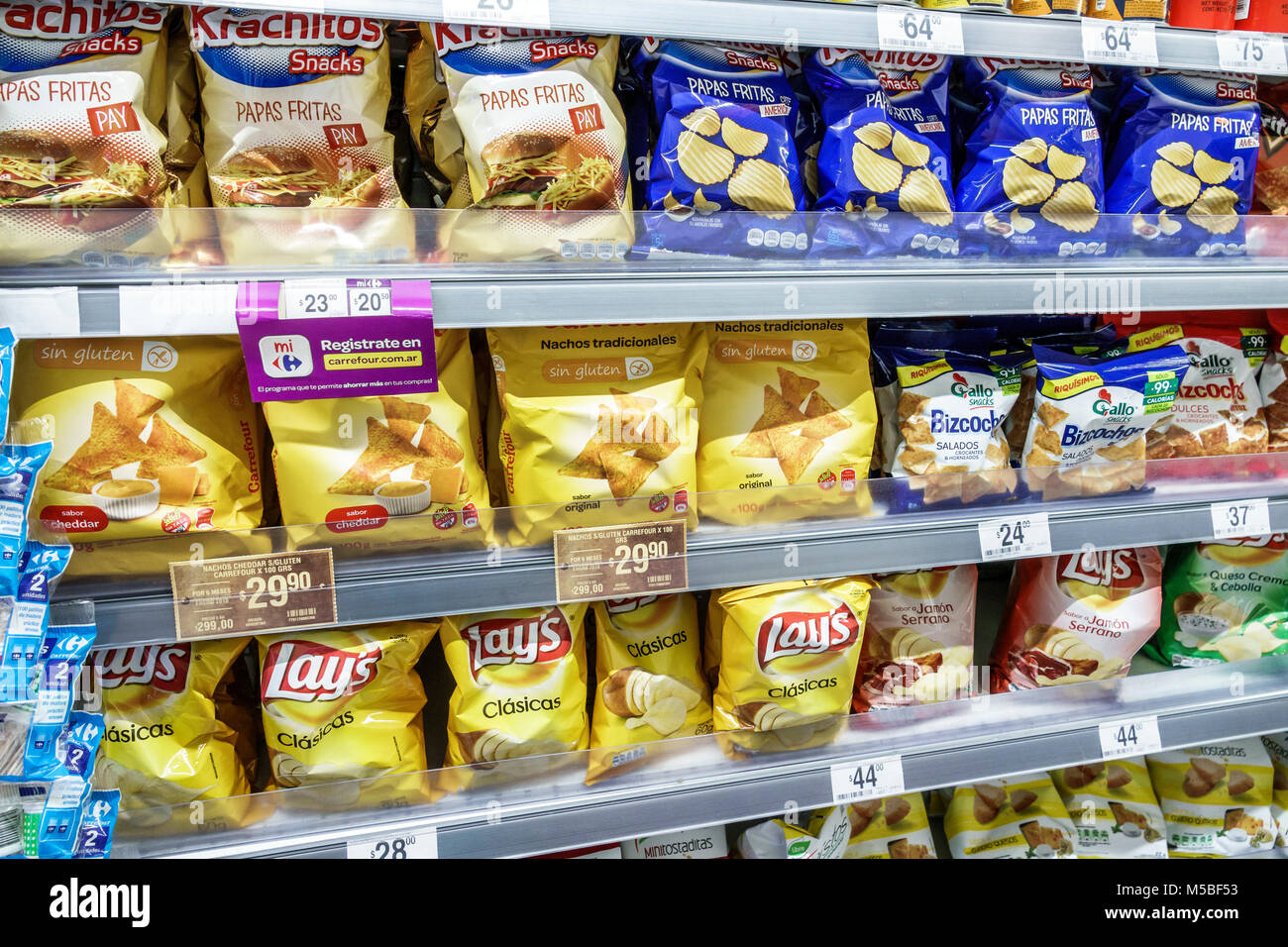 Buenos Aires Argentina,Carrefour Express convenience store grocery supermarket food,interior inside,snacks,potato chips,Lay's,brand,shelves display,vi Stock Photo