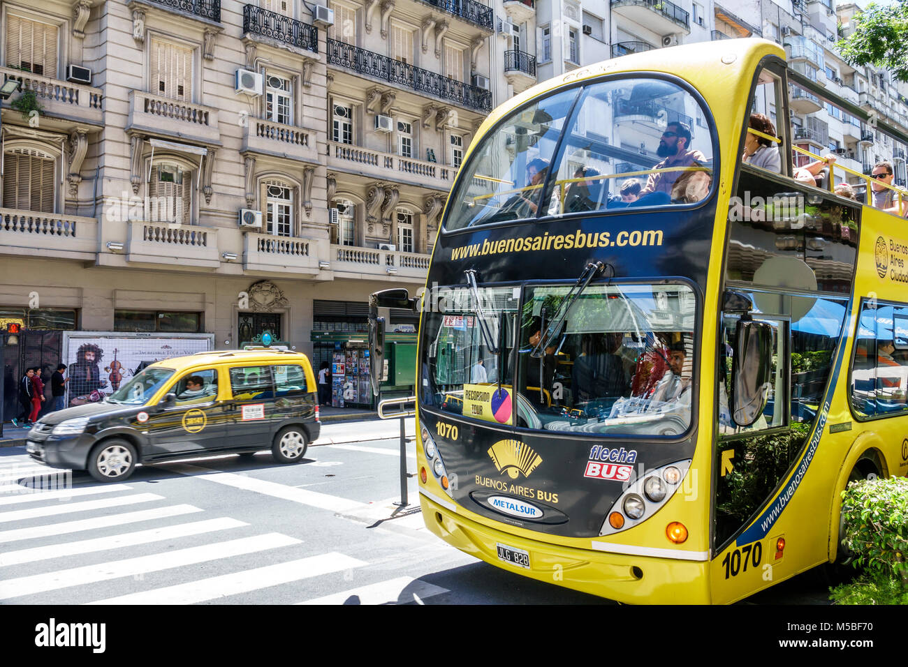 Buenos Aires Argentina,Avenida Cordova,hop-on hop-off,sightseeing bus,taxi,ARG171125234 Stock Photo