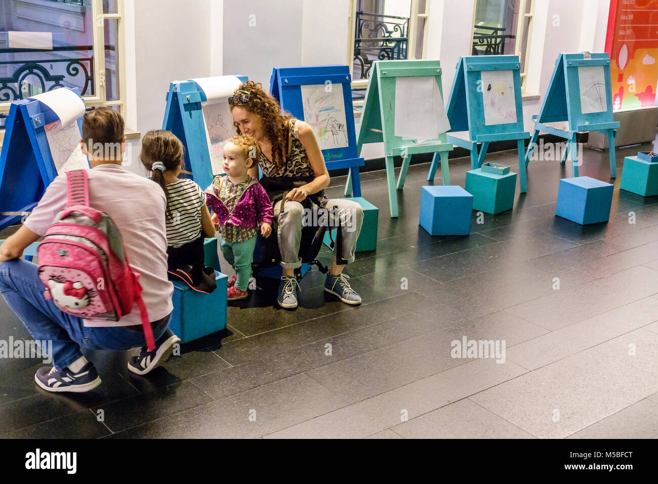 Buenos Aires Argentina,Centro Cultural Kirchner CCK,cultural centre,interior inside,children's activity floor,drawing,easels,Hispanic,woman female wom Stock Photo