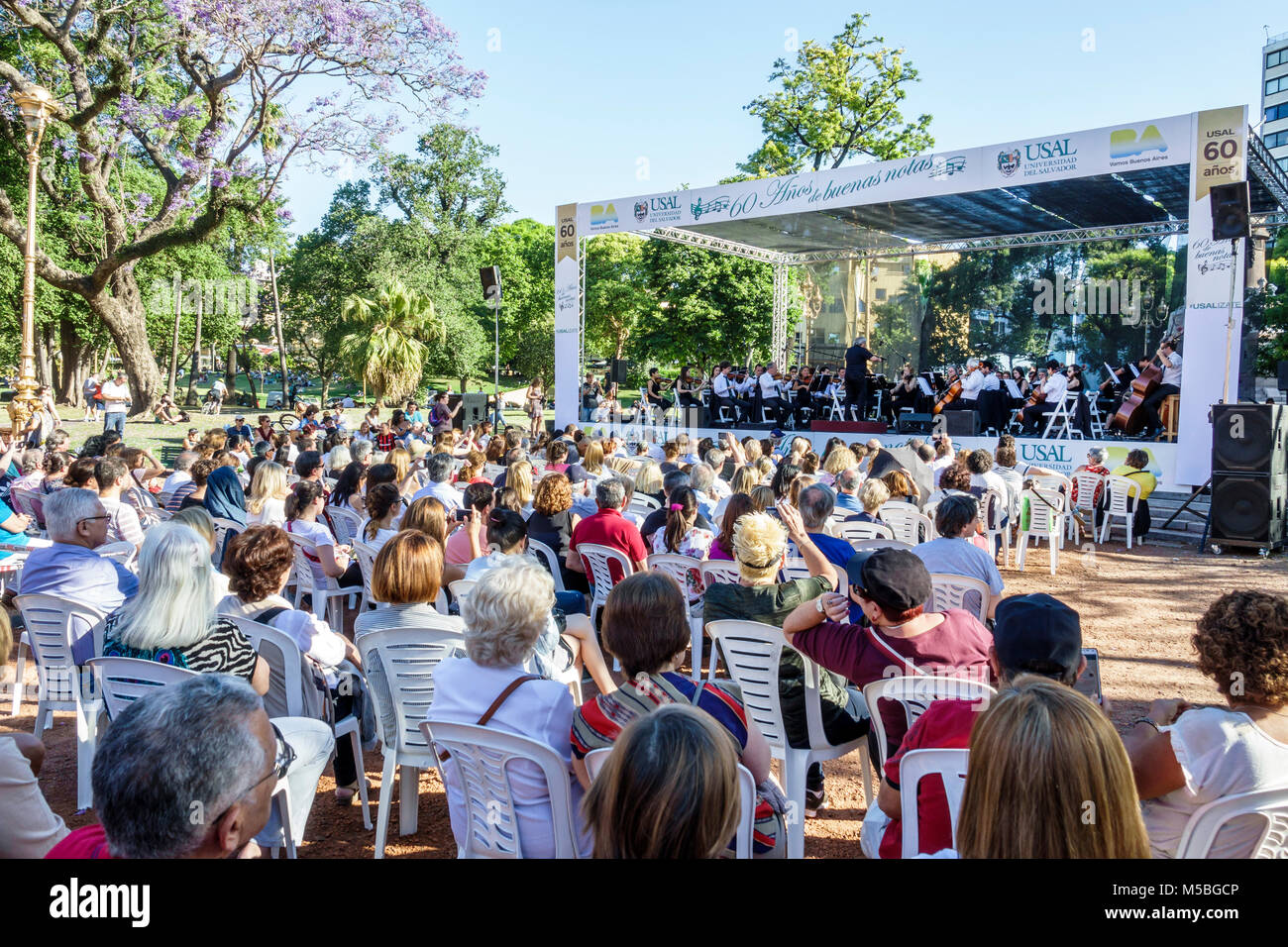 Buenos Aires Argentina,Recoleta,Plaza Francia,park,Universidad del Salvador symphony orchestra free performance,audience,stage,outdoor,Hispanic Latin Stock Photo