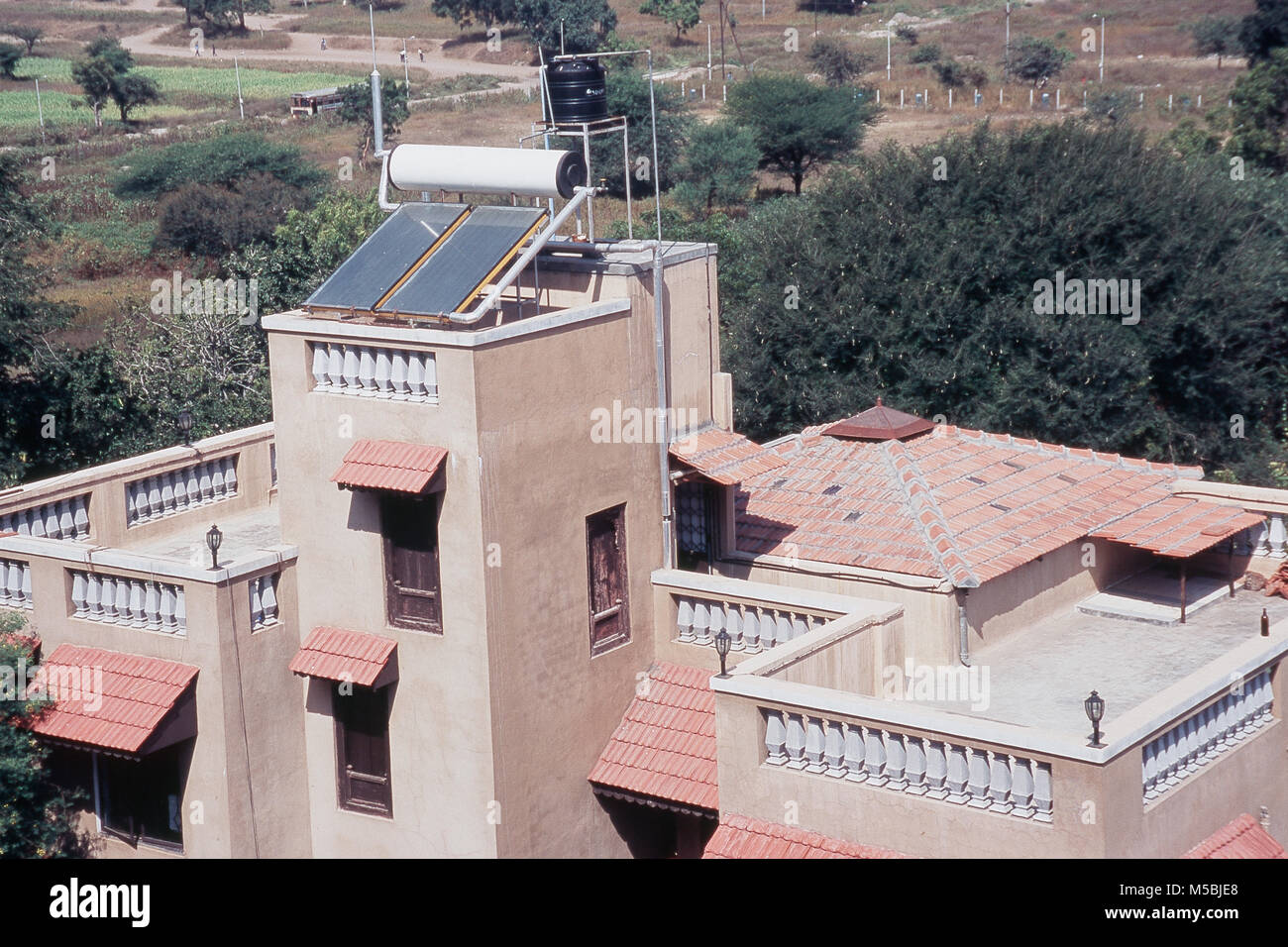 Solar water heater on building terrace Kothrud, Pune, Maharashtra, India Stock Photo