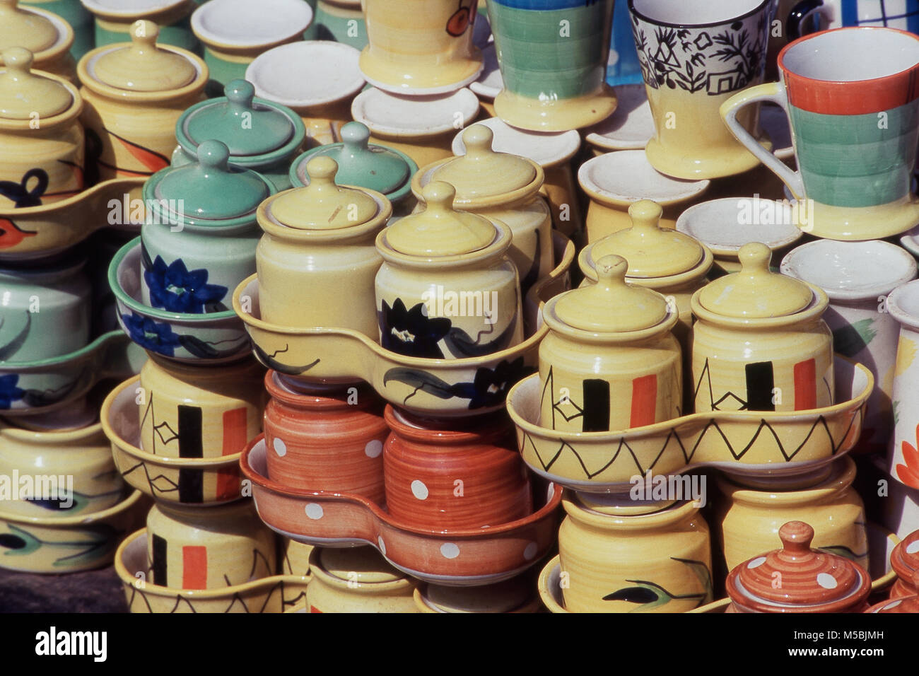 Close up of colorful crockery for sale in Maharashtra, India Stock Photo