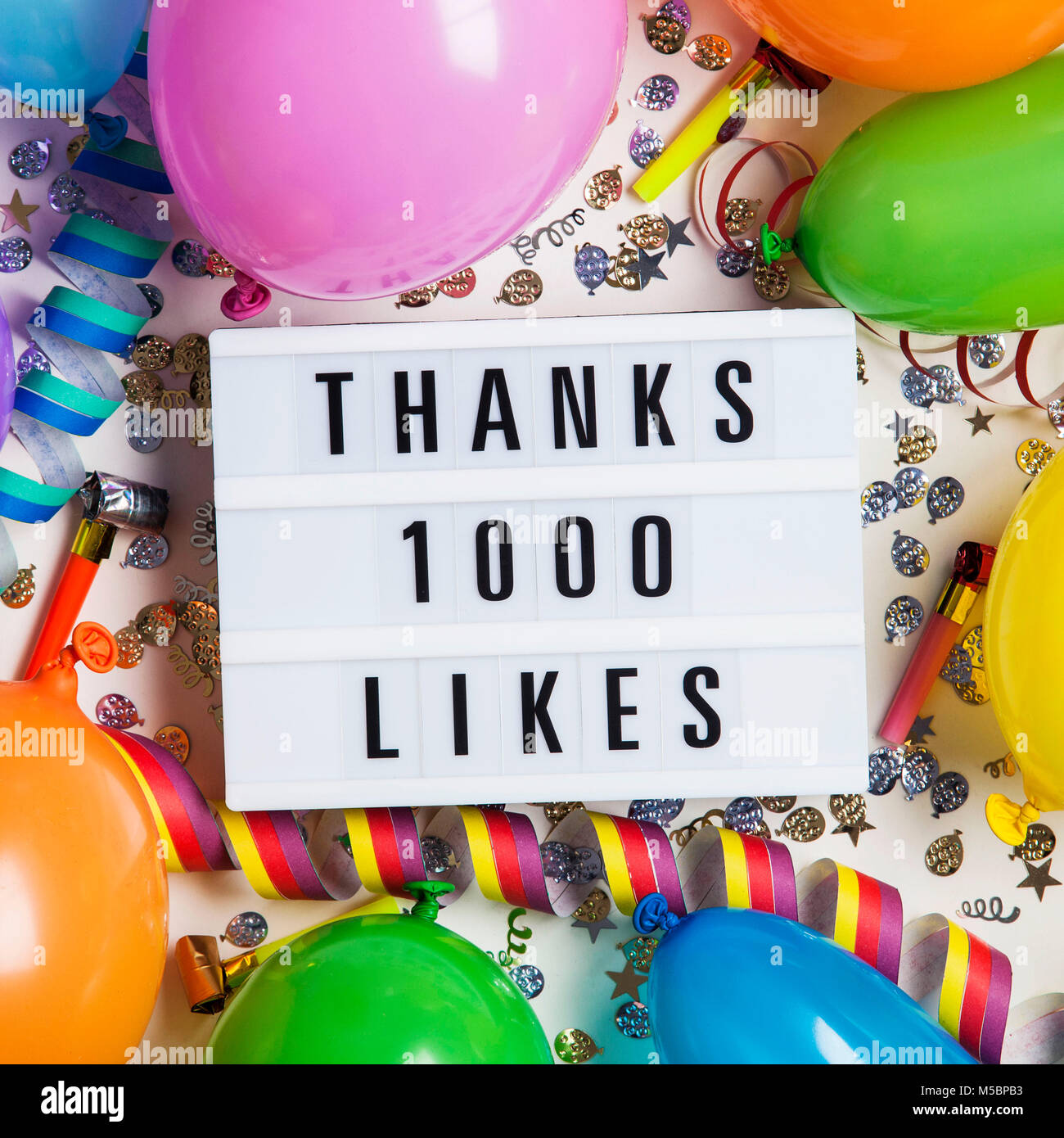 Thanks 1 thousand likes social media lightbox background. Celebration of followers, subscribers, likes. Stock Photo