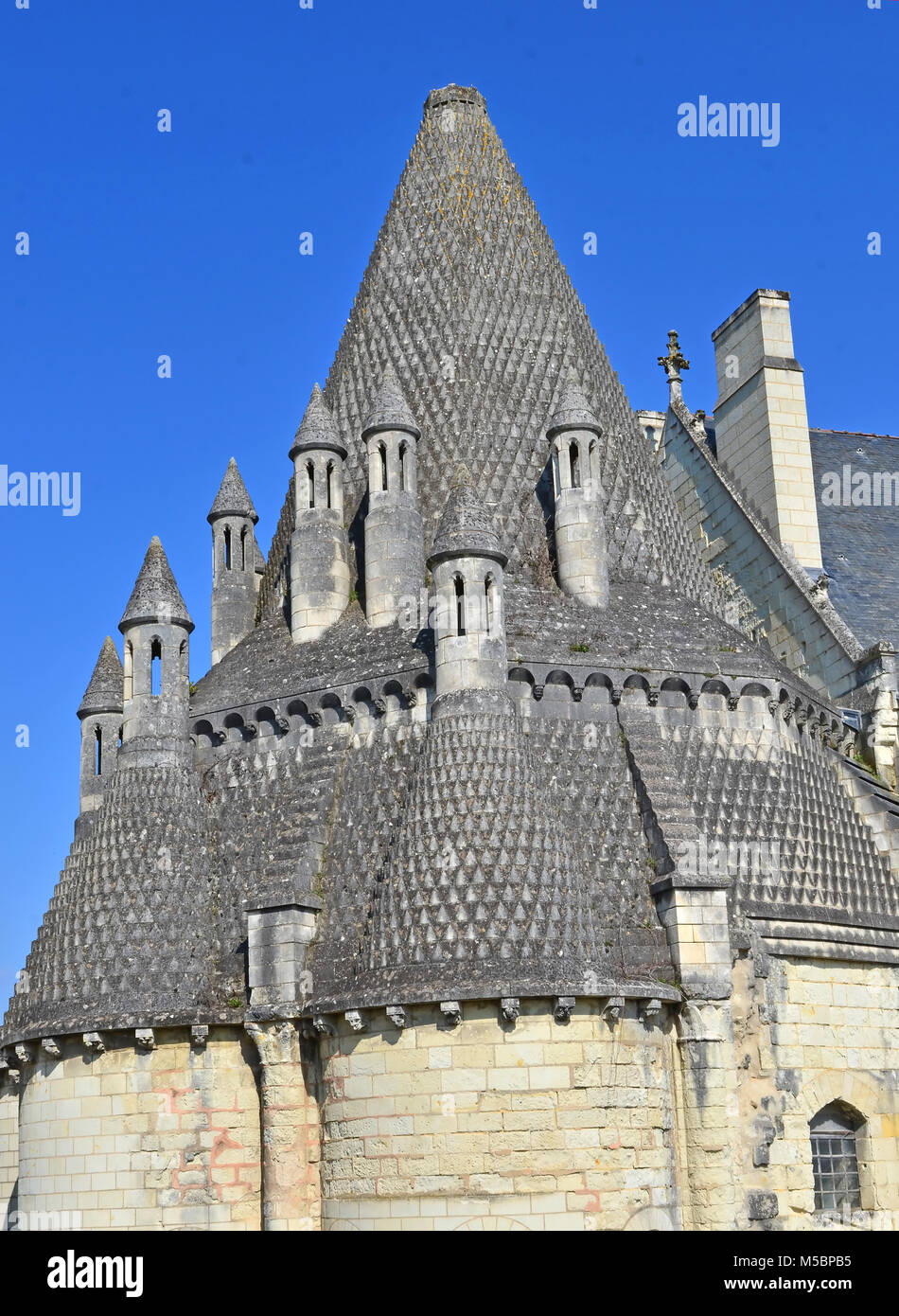 Stone roof of Medieval kitchen building with 8 chimneys Stock Photo Alamy