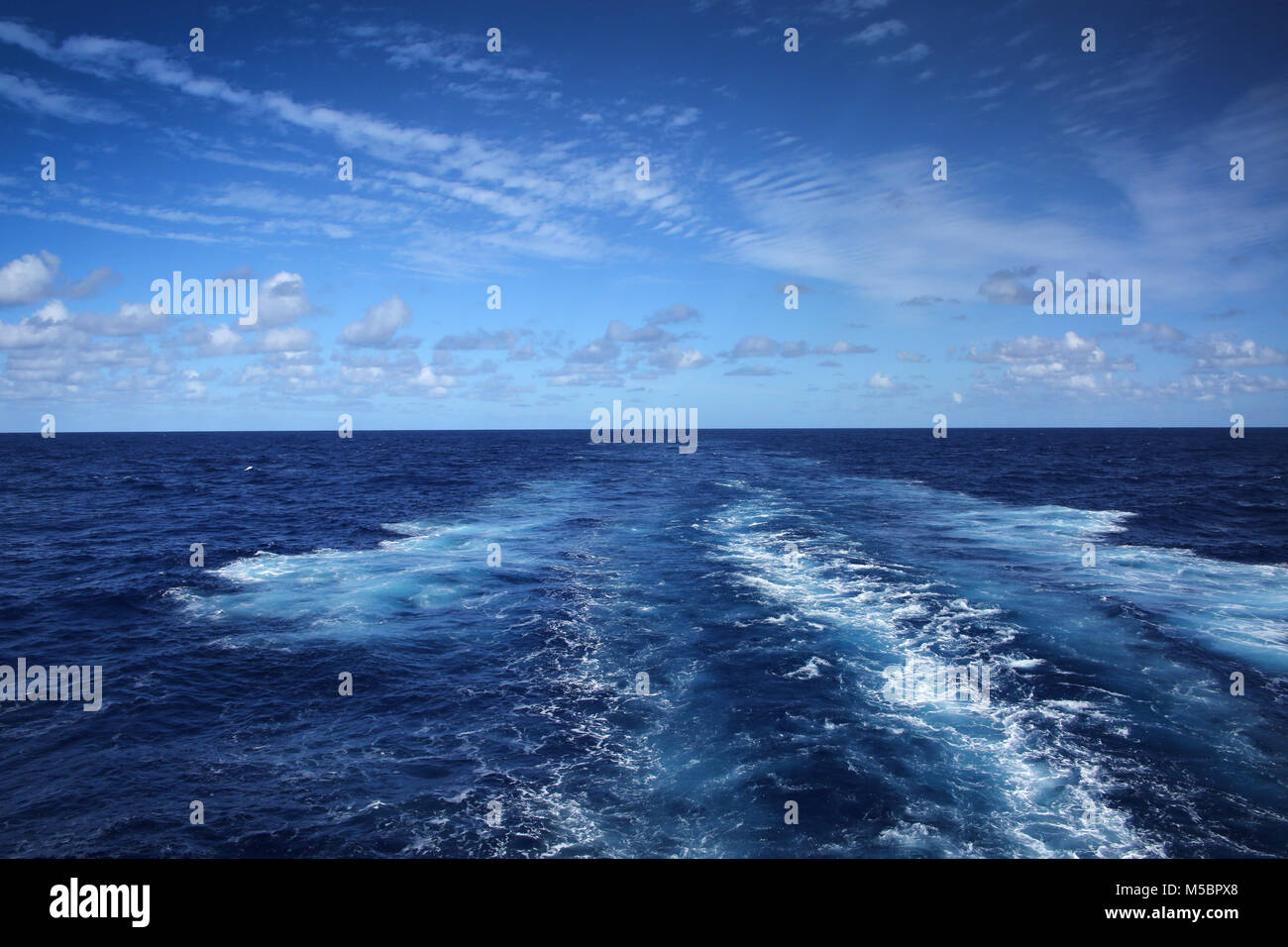 Wake of a ship across the Atlantic Ocean, on a beautiful day. Stock Photo