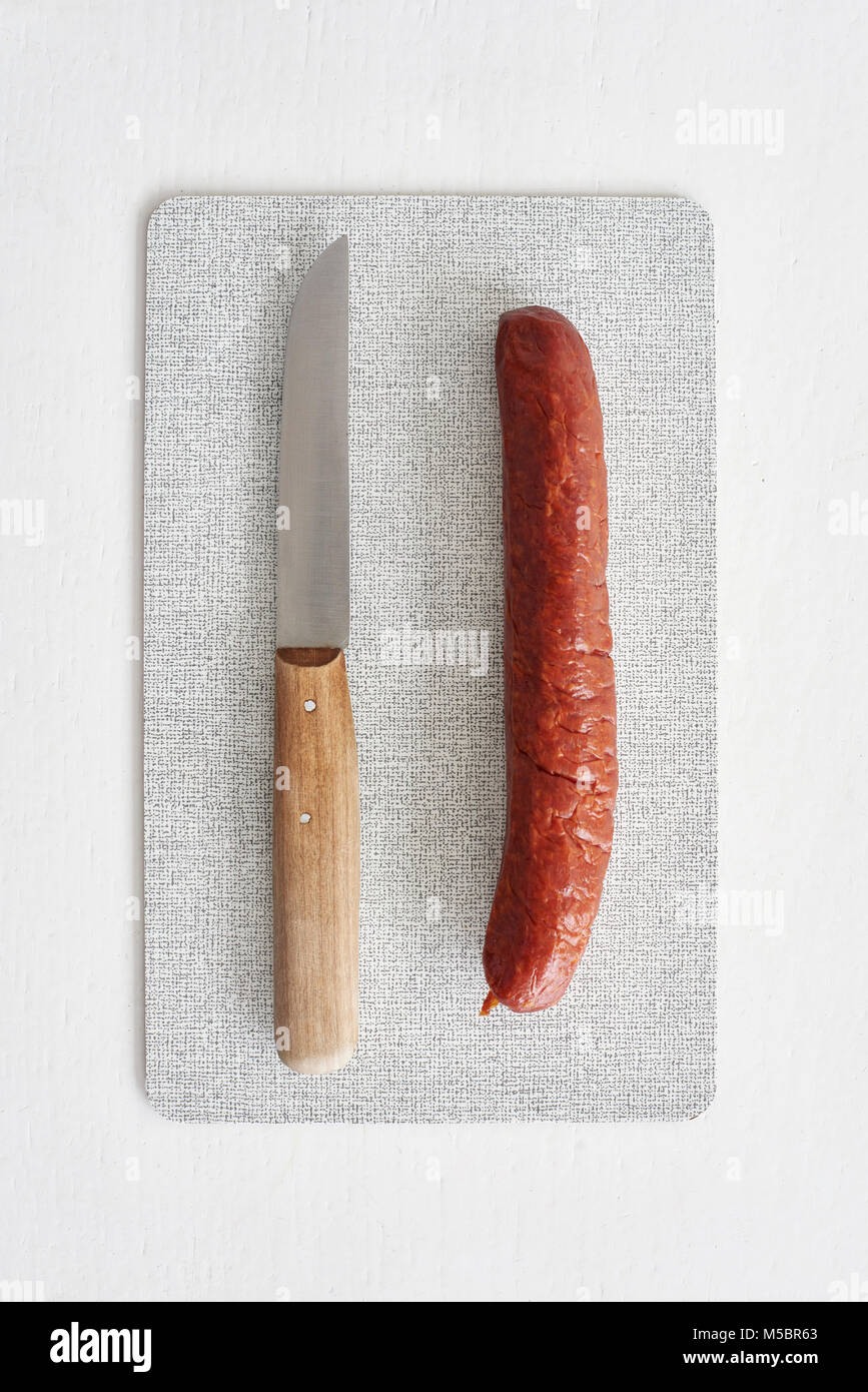 Wurst mit Messer Stock Photo