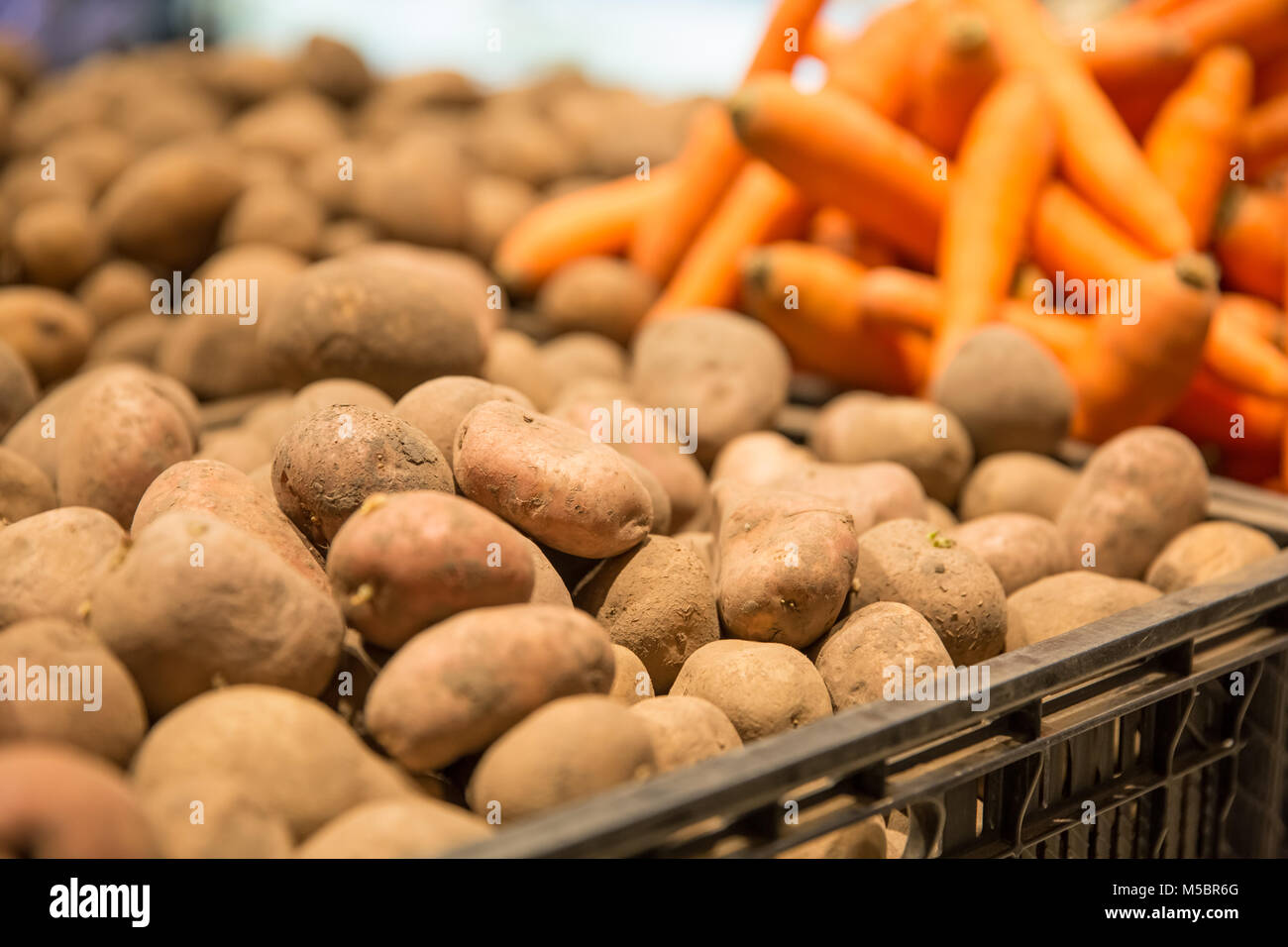 Fresh Mandarin Potato And Carrot Texture In The Market Background Stock Photo Alamy