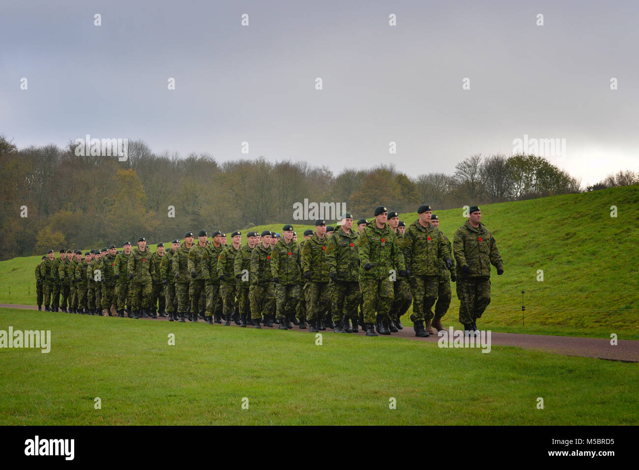 Members of the Canadian Armed Forces marching to the Remembrance Day Ceremony at The Canadian National Vimy Memorial on November 11, 2014 Stock Photo