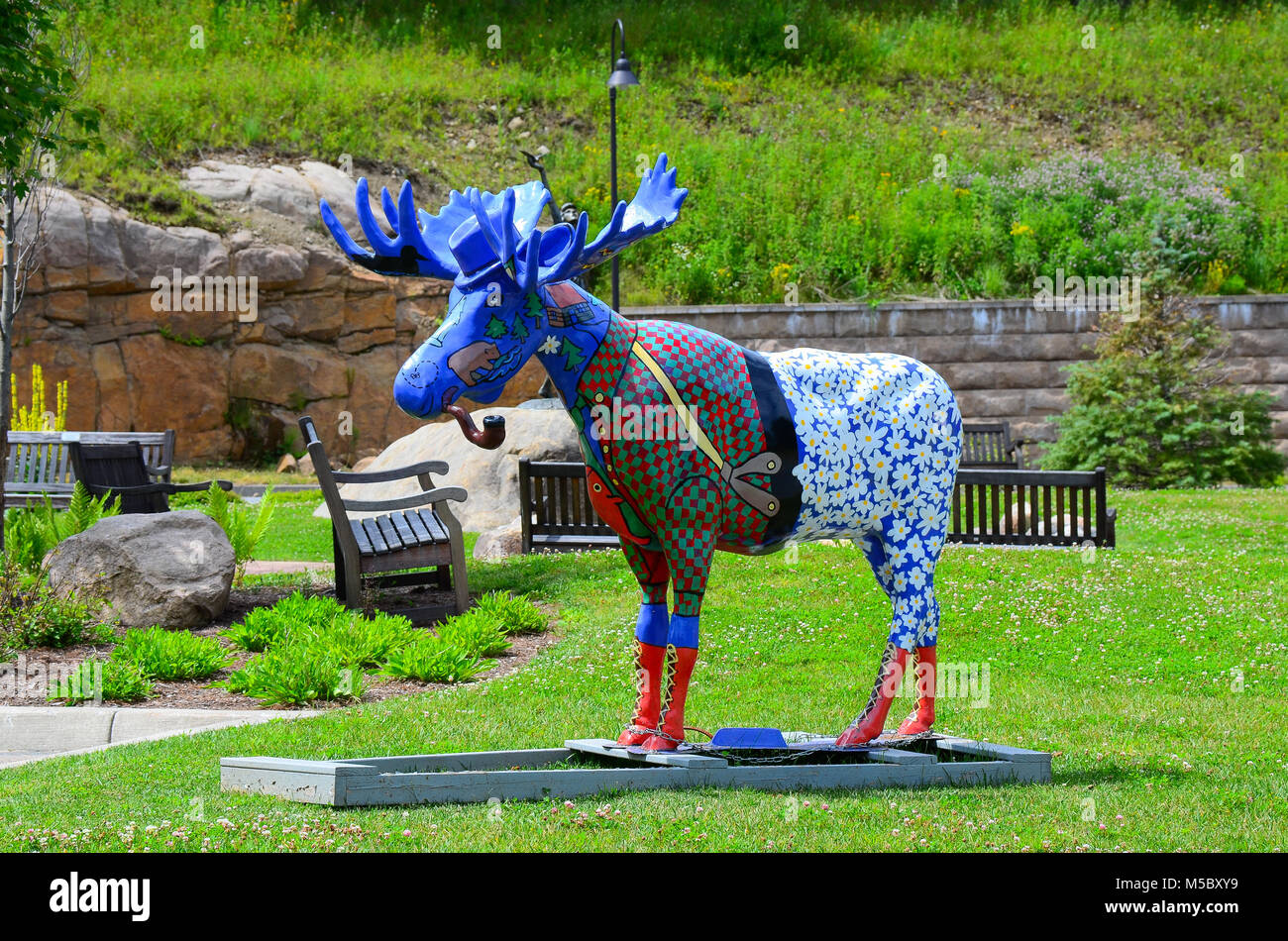 A statue of an artistic moose named 'Url' the the View - the Art Center, Old Forge, NY USA, a gift to the View and decorated by area students. Stock Photo