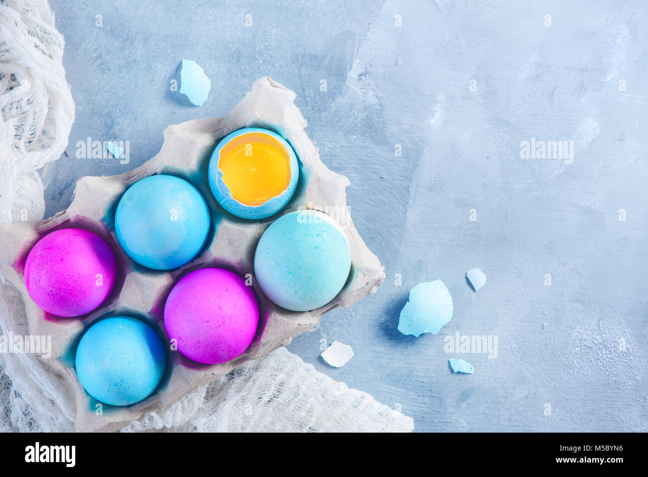 Close-up of fresh Easter eggs in a paper tray. Top view with copy space. Stock Photo