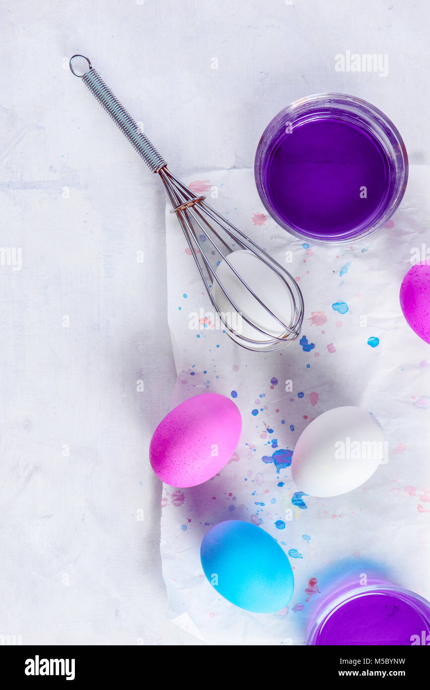 Easy way to paint Easter eggs. Using a whisk and food dye. Minimalist