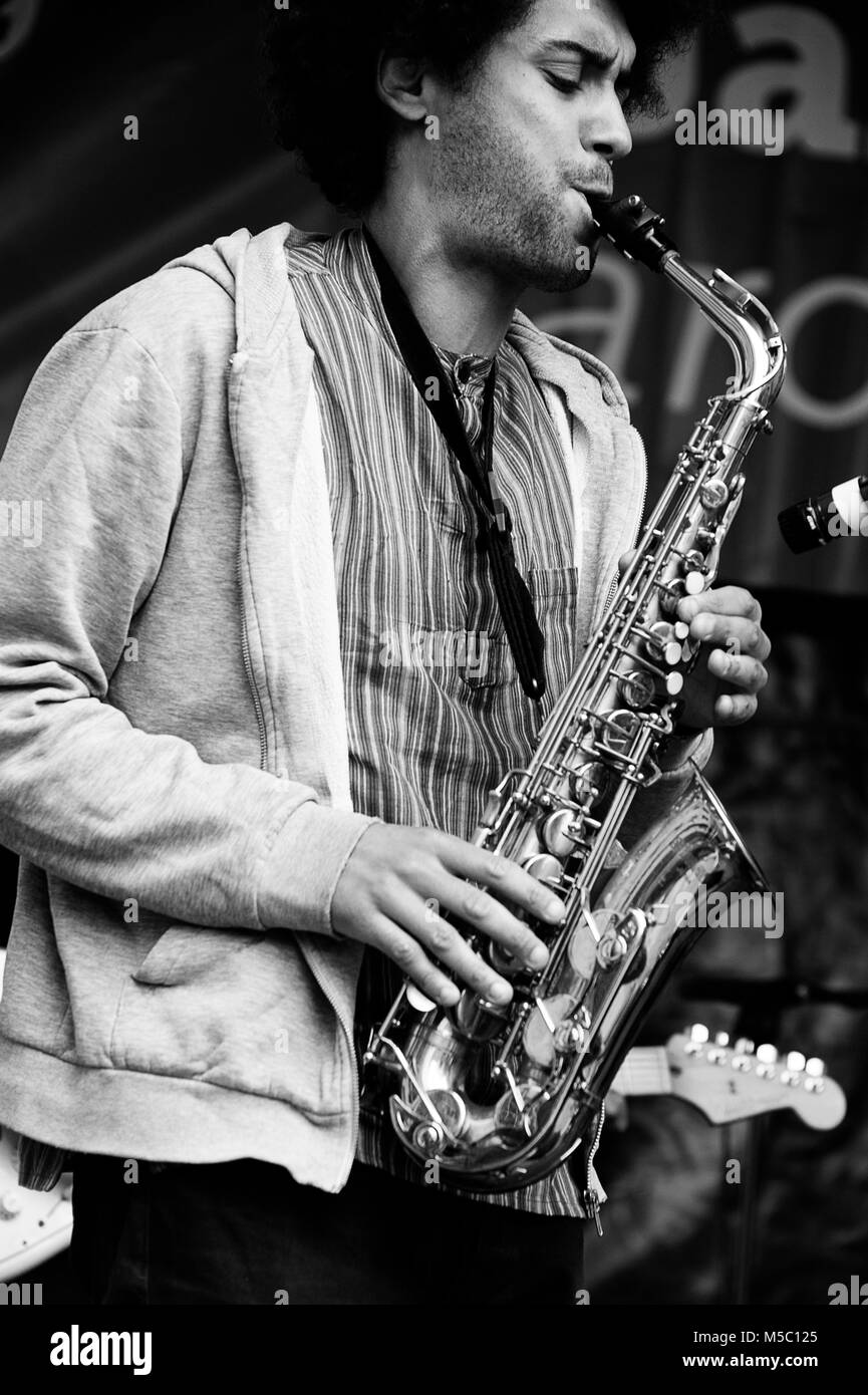 Saxophone player performing at Cheltenham Jazz Festival Stock Photo Alamy